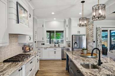 Dreaming of a home where golf, lakes, sunset patio evenings, and on Hide-A-Way Lake Golf Course in Texas - for sale on GolfHomes.com, golf home, golf lot