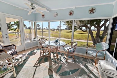 2bed/2bath home with a lovely golf course view in Barefoot Bay! on Barefoot Bay Golf Course in Florida - for sale on GolfHomes.com, golf home, golf lot