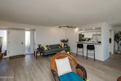 Location, Location, Location! This updated golf course condo on London Bridge Golf Course in Arizona - for sale on GolfHomes.com, golf home, golf lot