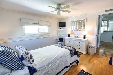 2bed/2bath home with a lovely golf course view in Barefoot Bay! on Barefoot Bay Golf Course in Florida - for sale on GolfHomes.com, golf home, golf lot