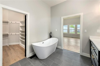 Two high-quality newly constructed 3BR2BA lake homes at Linn on Linn Valley Lakes - Deer Trace Golf Course in Kansas - for sale on GolfHomes.com, golf home, golf lot