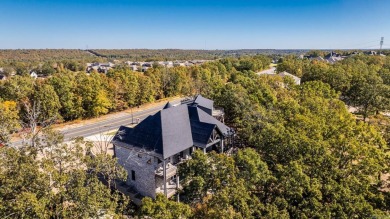 Discover a luxurious Fox Block concrete home featuring on Greystone Country Club in Arkansas - for sale on GolfHomes.com, golf home, golf lot