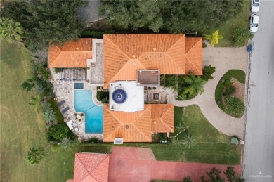 Remarkable residence spanning 5,945 square feet of living space on Harlingen Country Club in Texas - for sale on GolfHomes.com, golf home, golf lot