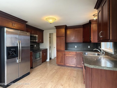 Resort-Style Living at an Affordable Price! Welcome home to this on Pocono Farms Country Club in Pennsylvania - for sale on GolfHomes.com, golf home, golf lot