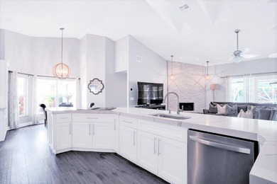 Luxury Turn Key is golf cart distance to WEF! This gorgeous on The Wanderers Club in Florida - for sale on GolfHomes.com, golf home, golf lot