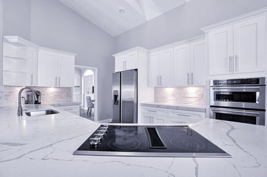 Luxury Turn Key is golf cart distance to WEF! This gorgeous on The Wanderers Club in Florida - for sale on GolfHomes.com, golf home, golf lot