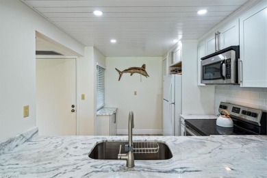 WOW! Fabulously updated 2nd floor unit with a perfect North on Quail Run Golf Club In Naples in Florida - for sale on GolfHomes.com, golf home, golf lot
