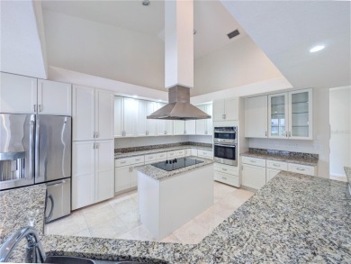 One or more photo(s) has been virtually staged. WATERFRONT on Saint Andrews South Golf Club in Florida - for sale on GolfHomes.com, golf home, golf lot