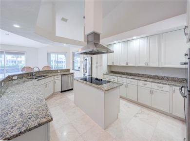 One or more photo(s) has been virtually staged. WATERFRONT on Saint Andrews South Golf Club in Florida - for sale on GolfHomes.com, golf home, golf lot