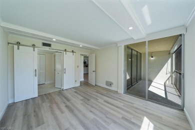 WOW! Fabulously updated 2nd floor unit with a perfect North on Quail Run Golf Club In Naples in Florida - for sale on GolfHomes.com, golf home, golf lot