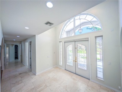 One or more photo(s) has been virtually staged. WATERFRONT on Saint Andrews South Golf Club in Florida - for sale on GolfHomes.com, golf home, golf lot
