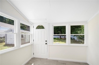 Tucked away in one of the most sought-after neighborhoods in on on Potowomut Golf Club in Rhode Island - for sale on GolfHomes.com, golf home, golf lot