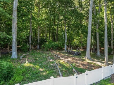 Tucked away in one of the most sought-after neighborhoods in on on Potowomut Golf Club in Rhode Island - for sale on GolfHomes.com, golf home, golf lot
