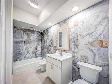 One or more photo(s) has been virtually staged. WATERFRONT on Saint Andrews South Golf Club in Florida - for sale on GolfHomes.com, golf home, golf lot