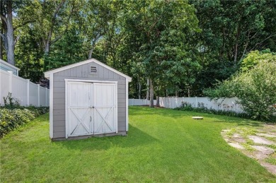 Tucked away in one of the most sought-after neighborhoods in on on Potowomut Golf Club in Rhode Island - for sale on GolfHomes.com, golf home, golf lot