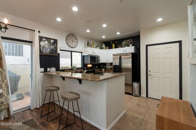 Discover comfort, style, and convenience in this fully furnished on London Bridge Golf Course in Arizona - for sale on GolfHomes.com, golf home, golf lot