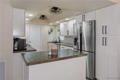 Carefree Living with Golf Course Views - Ground-Level End Unit! on Sugarmill Woods Golf and Country Club in Florida - for sale on GolfHomes.com, golf home, golf lot