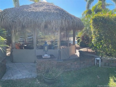 Discover the ultimate blend of luxury and convenience with this on St. Lucie Trail Golf Club in Florida - for sale on GolfHomes.com, golf home, golf lot