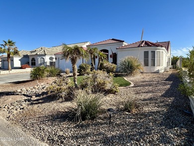 Located on the 4th fairway of the prestigious Huukan Golf Course on Desert Lakes Golf Course in Arizona - for sale on GolfHomes.com, golf home, golf lot