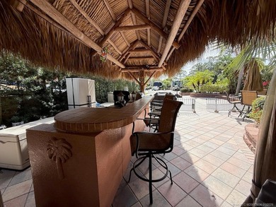 Discover the ultimate blend of luxury and convenience with this on St. Lucie Trail Golf Club in Florida - for sale on GolfHomes.com, golf home, golf lot