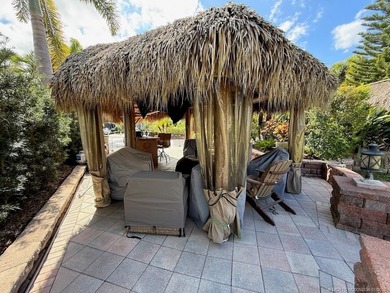 Discover the ultimate blend of luxury and convenience with this on St. Lucie Trail Golf Club in Florida - for sale on GolfHomes.com, golf home, golf lot