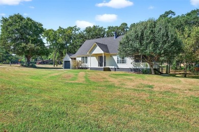 Welcome to this beautifully renovated 3 bedroom, 2 bath home on Lake Kiowa Golf Course in Texas - for sale on GolfHomes.com, golf home, golf lot