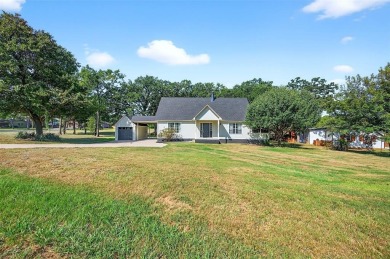 Welcome to this beautifully renovated 3 bedroom, 2 bath home on Lake Kiowa Golf Course in Texas - for sale on GolfHomes.com, golf home, golf lot