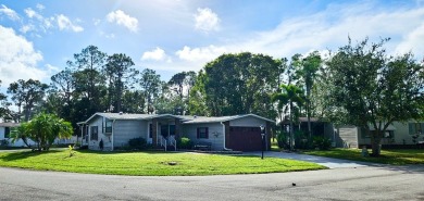 Welcome to this beautifully furnished two-bedroom, two-bath home on Pine Lakes Country Club in Florida - for sale on GolfHomes.com, golf home, golf lot