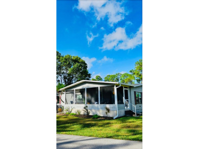 Welcome to this beautifully furnished two-bedroom, two-bath home on Pine Lakes Country Club in Florida - for sale on GolfHomes.com, golf home, golf lot