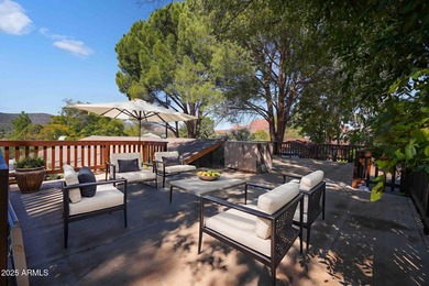 Charming house nestled among mature trees on a quiet street on Canyon Mesa Country Club in Arizona - for sale on GolfHomes.com, golf home, golf lot