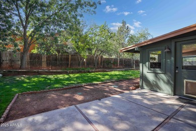 Charming house nestled among mature trees on a quiet street on Canyon Mesa Country Club in Arizona - for sale on GolfHomes.com, golf home, golf lot