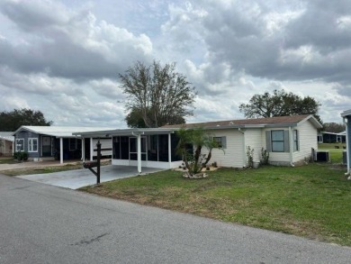 Incredible Opportunity - Resort-like Lifestyle!    This home is on Lake Henry Golf Club in Florida - for sale on GolfHomes.com, golf home, golf lot