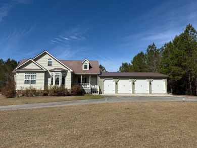 This stunning property, situated on 22 acres in the Lowcountry on Penny Branch Club in South Carolina - for sale on GolfHomes.com, golf home, golf lot