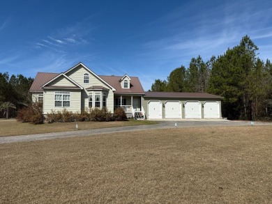 This stunning property, situated on 22 acres in the Lowcountry on Penny Branch Club in South Carolina - for sale on GolfHomes.com, golf home, golf lot