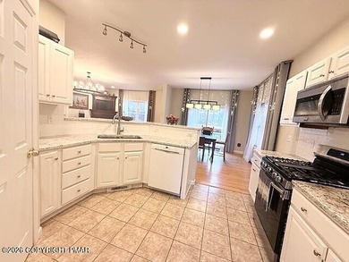 Welcome to your dream home! This exquisitely designed 5-bedroom on Pocono Farms Country Club in Pennsylvania - for sale on GolfHomes.com, golf home, golf lot