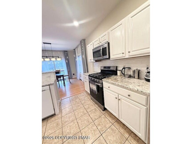 Welcome to your dream home! This exquisitely designed 5-bedroom on Pocono Farms Country Club in Pennsylvania - for sale on GolfHomes.com, golf home, golf lot