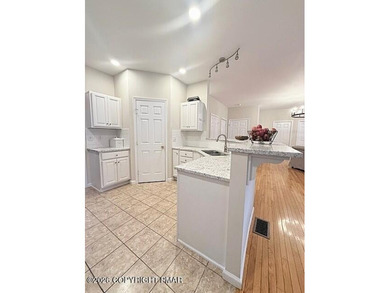 Welcome to your dream home! This exquisitely designed 5-bedroom on Pocono Farms Country Club in Pennsylvania - for sale on GolfHomes.com, golf home, golf lot