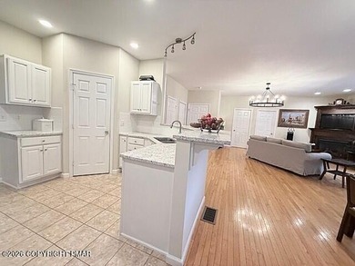 Welcome to your dream home! This exquisitely designed 5-bedroom on Pocono Farms Country Club in Pennsylvania - for sale on GolfHomes.com, golf home, golf lot