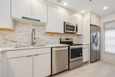 Renovated first floor condo with 2 bedrooms and 2 full baths on Capri Isle Golf Club in Florida - for sale on GolfHomes.com, golf home, golf lot