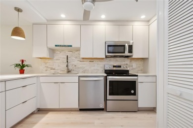 Renovated first floor condo with 2 bedrooms and 2 full baths on Capri Isle Golf Club in Florida - for sale on GolfHomes.com, golf home, golf lot