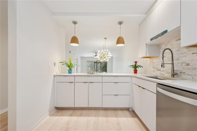 Renovated first floor condo with 2 bedrooms and 2 full baths on Capri Isle Golf Club in Florida - for sale on GolfHomes.com, golf home, golf lot