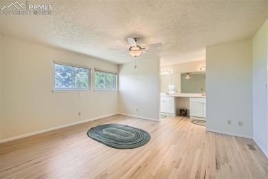 Welcome home to this freshly remodeled (2024) two-story townhome on Country Club of Colorado in Colorado - for sale on GolfHomes.com, golf home, golf lot