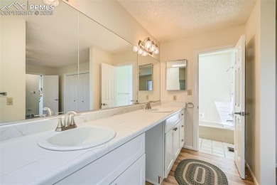 Welcome home to this freshly remodeled (2024) two-story townhome on Country Club of Colorado in Colorado - for sale on GolfHomes.com, golf home, golf lot