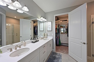 Welcome to resort-style living in Esplanade at Azario. This on Esplanade Golf and Country at Lakewood Ranch in Florida - for sale on GolfHomes.com, golf home, golf lot