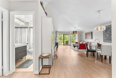 Impeccably updated 2-bed / 2-bath home in the desirable Club on PGA National Golf Club in Florida - for sale on GolfHomes.com, golf home, golf lot