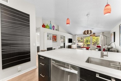 Impeccably updated 2-bed / 2-bath home in the desirable Club on PGA National Golf Club in Florida - for sale on GolfHomes.com, golf home, golf lot