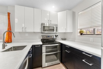 Impeccably updated 2-bed / 2-bath home in the desirable Club on PGA National Golf Club in Florida - for sale on GolfHomes.com, golf home, golf lot