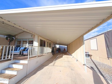 Up-close panoramic lake views right from your front patio inside on London Bridge Golf Course in Arizona - for sale on GolfHomes.com, golf home, golf lot