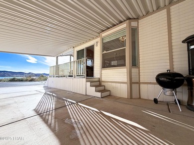 Up-close panoramic lake views right from your front patio inside on London Bridge Golf Course in Arizona - for sale on GolfHomes.com, golf home, golf lot