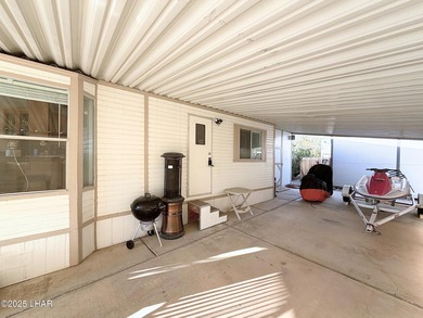 Up-close panoramic lake views right from your front patio inside on London Bridge Golf Course in Arizona - for sale on GolfHomes.com, golf home, golf lot